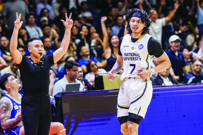 Paul Francisco came alive in overtime, drilling back-to-back triples to lift the NU Bulldogs past Ateneo. UAAP PHOTO