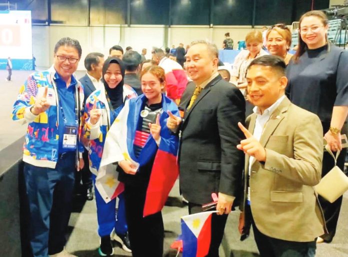 sports_Carpio_resized (1) Kram Airam Carpio (center) captured the Philippines’ first gold medal in pencak silat at the Asian Youth Games in Manama, Bahrain. POC PHOTO