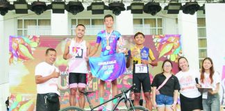Some of the winners of the MassKara Duathlon Race celebrate their triumph. PHOTO BY CESAR JOLITO III