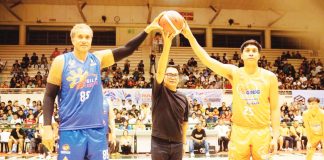 The ceremonial toss, featuring Gilas Pilipinas legend Asi Taulava, during the Legends Rise: MassKara Gugma All-Star Exhibition Game. PHOTO COURTESY OF GREG GASATAYA
