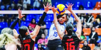 ZUS Coffee Thunderbelles’ Alexa Miner soars for a spike against two Petro Gazz defenders. PVL PHOTO