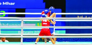 Negrense boxer Leo Mhar Lobrido trades blows with Uzbekistan’s Abdugani Yorkinjonov in their Boys’ 46-kg semifinal bout. POC PHOTO