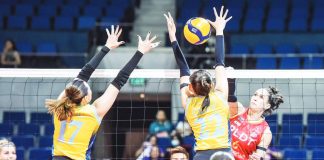 PLDT High Speed Hitters’ Savannah Davison scores against the defense of Capital1 Solar Spikers’ Leila Cruz. PVL PHOTO