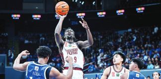 Francis Nnoruka of the University of the Philippines Fighting Maroons drives strong against Ateneo’s Divine Adili during their UAAP clash at the Mall of Asia Arena. UAAP PHOTO
