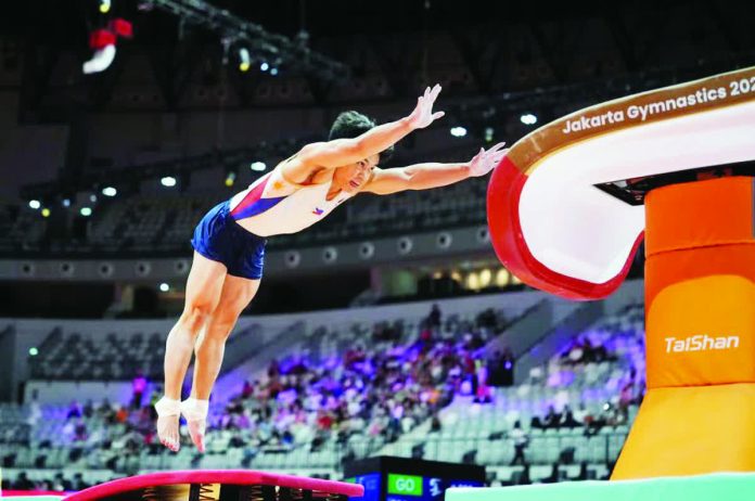 Filipino gymnast Carlos Edriel Yulo tackles the vault to win gold in the 2025 FIG Artistic Gymnastics World Championships in Jakarta, Indonesia. AP