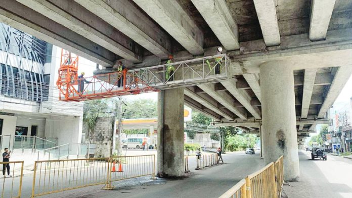 ungka flyover The Department of Public Works and Highways Region 6 (DPWH-6) says a monitoring survey is periodically being carried out to ensure the safety of the Ungka Flyover in Pavia, Iloilo. Photo shows the DPWH-6 technical team conducting a Rapid Visual Assessment on the flyover on Oct. 1 after a magnitude 6.9 earthquake hit Cebu on Sept. 30, 2025. AJ PALCULLO/PN