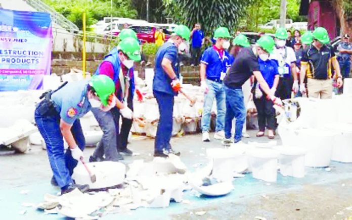 unregistered_products_copy_resized_compressed Department of Trade and Industry Assistant Secretary Regino Mallari Jr. led the destruction of about P4.6 million worth of unregistered items as part of the Consumer Welfare Month in a ceremony at the DTI-Fair Trade Enforcement Bureau warehouse in Marikina City on Wednesday, Oct. 22, 2025. PNA PHOTO BY JOANN VILLANUEVA