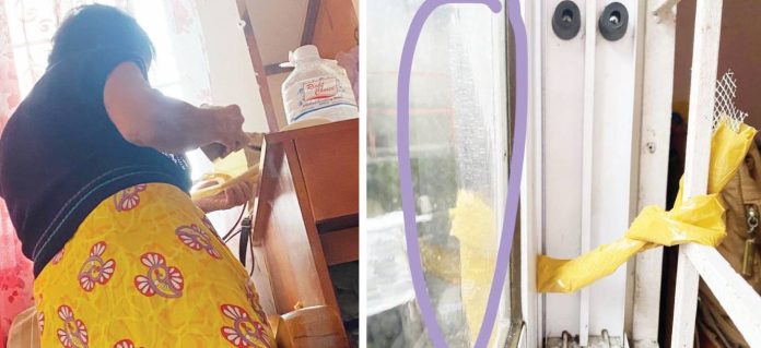 2knife-storm As Typhoon Tino’s fierce winds battered Iloilo, 83-year-old Norma Molina Malte of Barangay Tabuc Suba, Jaro, Iloilo City quietly performed a time-honored folk ritual — tying a kitchen knife to the window with a strip of yellow plastic. She believes the blade “cuts through” the swirling wind, calming the storm’s fury. Though rooted in old Visayan superstition, her act reveals a deep faith interwoven with tradition—a small gesture of hope and protection amid nature’s wrath. PHOTOS BY MARIA BIANCA VILLANUEA / CONTRIBUTOR