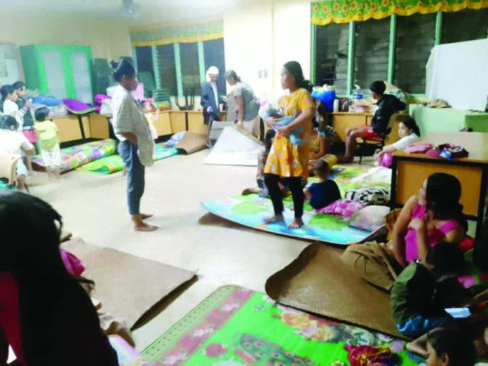 Antique_displaced_families_copy_resized_compressed Evacuees from Iki and Bahol in the mountainous areas of Barangay Capnayan take shelter at Capnayan Primary School in Laua-an on, Antique, on the night of November 3. PROVINCE OF ANTIQUE PHOTO