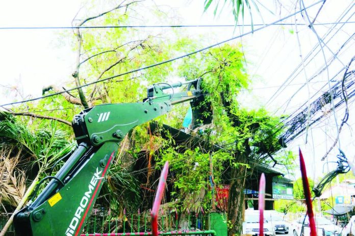 Damaged telco wires and posts in Bacolod City, left hazardous to motorists and pedestrians, obstructing emergency operations and contributing to urban blight, following the impact of Typhoon “Tino” on November 4. MAYOR GREG GASATAYA PHOTO