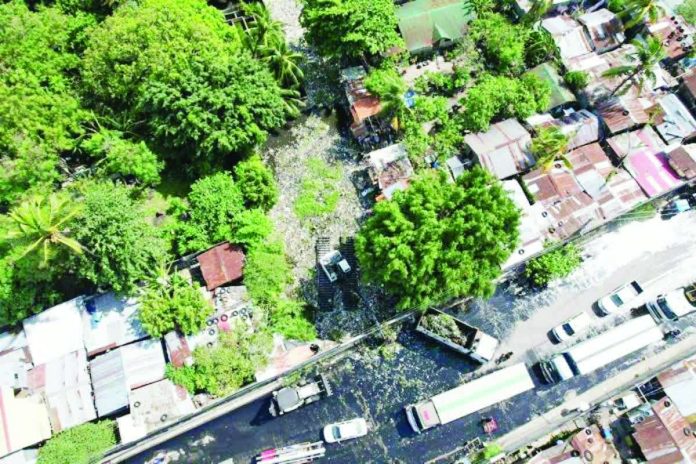 Bacolod_houses About 80 houses along Mambuloc Creek in Barangay 2, Bacolod City are set for relocation after city government officials identified these structures as hazards that obstruct natural water flow and contribute to frequent flooding in nearby communities. BCD PIO PHOTO