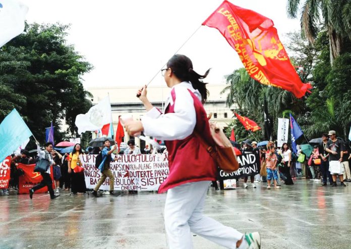 CBCP Youth groups gather at Liwasang Bonifacio to call for accountability amid the continuing scandal of government corruption in flood control projects. MARIANNE BERMUDEZ, PHILIPPINE DAILY INQUIRER