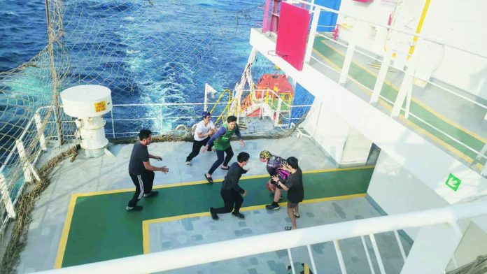 Filipino_seafarers_resized_compressed A massive P1.06 trillion of total economic impact, or 4% of the Philippine gross domestic product, is generated from Filipino seafarers in the maritime industry. Photo shows seafarers playing basketball on board a ship during their free time. CONTRIBUTED PHOTO
