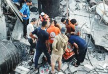 Israeli strikes in Gaza kill 104; Hamas accused of killing soldier Rescuers gather as four people are killed in an Israeli strike in Nuseirat refugee camp, in central Gaza Strip. BBC