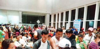 Stranded Guimarasnon passengers and workers wait for assistance at Parola Wharf, Iloilo City, on the night of November 9, after sea travel was suspended due to Typhoon “Uwan.” The Provincial Government of Guimaras provided food packs and transport aid to affected individuals. PROVINCE OF GUIMARAS PHOTO