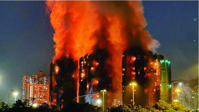 Hong_Kong_copy_resized_compressed The blaze broke out at the Wang Fuk Court housing complex and was classified as a level five – the highest in severity. The complex was undergoing extensive renovations when the fire began. BBC