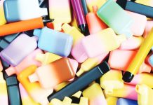A pile of disposable vapes of varying colors. The sale and supply of single use vapes in Northern Ireland was banned back in April 2025. GETTY IMAGES