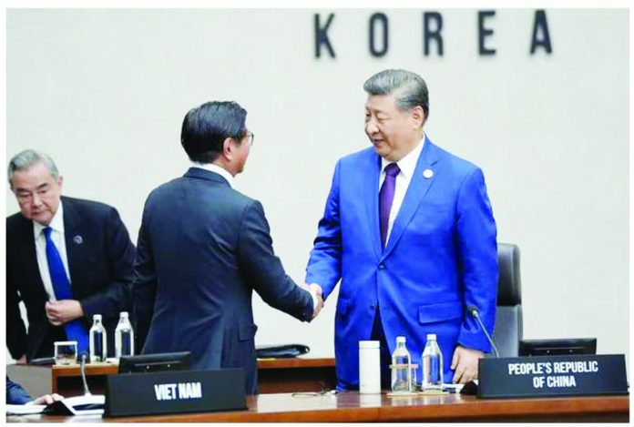 President Ferdinand Marcos Jr. shakes hands with Chinese President Xi Jinping during the handover ceremony of the Asia-Pacific Economic Cooperation (Apec) chairmanship on Saturday, Nov. 1, 2025. PHOTO COURTESY OF BONGBONG MARCOS/FACEBOOK