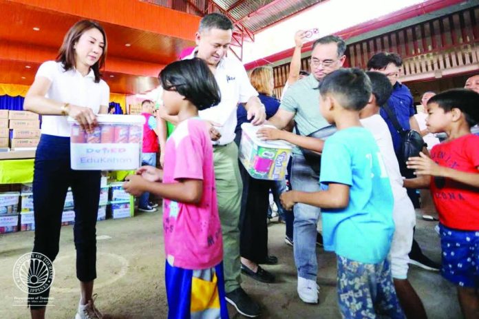Tourism Secretary Christina Garcia Frasco and Education Secretary Sonny Angara, on behalf of President Ferdinand Marcos Jr., led the national government’s relief operations and site inspection in severely affected areas of Negros Occidental on Nov. 11, 2025. DOT PHOTO