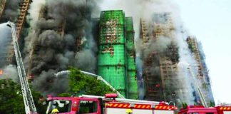 Thick smoke billows from the tower blocks at Wang Fuk Court, a high-rise residential complex in Hong Kong. The Department of Foreign Affairs (DFA) said Thursday it has no confirmed Filipino casualties so far, but noted that the Philippine Consulate General in Hong Kong had received “unverified information that some Filipino domestic workers may be trapped inside the buildings.” REUTERS