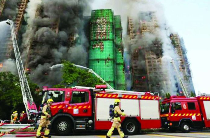 PH_verifying_copy_resized_compressed Thick smoke billows from the tower blocks at Wang Fuk Court, a high-rise residential complex in Hong Kong. The Department of Foreign Affairs (DFA) said Thursday it has no confirmed Filipino casualties so far, but noted that the Philippine Consulate General in Hong Kong had received “unverified information that some Filipino domestic workers may be trapped inside the buildings.” REUTERS