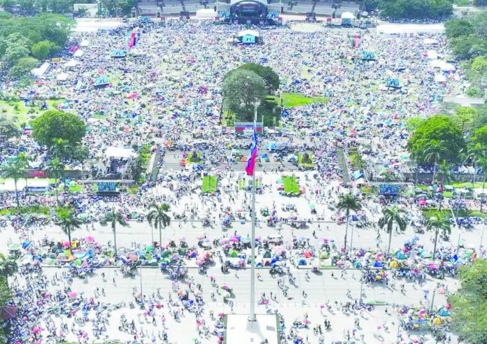 Aerial view of the Iglesia ni Cristo rally for accountability over a flood-control corruption scandal at the Quirino Grandstand in Rizal Park. It’s the latest show of outrage over accusations of widespread corruption in flood-control projects in one of the world’s most typhoon-prone countries. Various groups have protested in recent months following the discovery that thousands of flood defense projects across the country were substandard, incomplete or simply did not exist. Image courtesy of Manila DRRM Office /Facebook