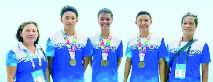 Three Pototan natives — Frenz Enrique Pasadilla, Jan Renier Pasadilla, and John Merck Millan — won bronze medals in their respective backstroke events at the Batang Pinoy 2025 National Finals in General Santos City, with their coach Doren Ducthilla and trainer Rho Ducthilla. PHOTO COURTESY OF CJAY GALITA