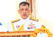 Thai King Maha Vajiralongkorn wears a royal uniform decorated with brooches. GETTY IMAGES