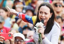 Venezuela opposition leader Maria Corina Machado speaks to the crowd. GETTY IMAGES
