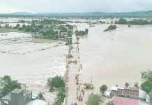 Initial agricultural damage due to ‘Uwan’ at P142 million — DA This aerial handout photo taken on November 10, 2025 and released by the Cagayan Provincial Information Office shows rescuers making their way through floodwaters to reach flooded homes at a village in Tuao, Cagayan province, after a river overflowed due to heavy rains brought by Super Typhoon “Uwan.” HANDOUT/CAGAYAN PROVINCIAL INFORMATION OFFICE/AFP
