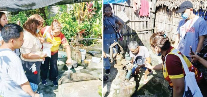danger-water Health workers from the Iloilo Provincial Health Office and San Joaquin town disinfect and test communal water sources in Barangay Bucaya following Typhoons Tino and Uwan, as part of the province’s emergency drive to prevent waterborne diseases. IPHO PHOTO