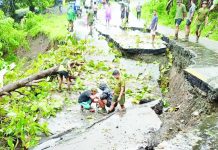 Early evacuation ordered across region All local governments in Western Visayas were ordered on Friday, Nov. 7, to implement preemptive evacuations in high-risk areas in preparation for Severe Tropical Storm “Uwan,” which is expected to enter the Philippine Area of Responsibility on Nov. 8. Photo shows a portion of the road in Lopez Vito, San Joaquin, Iloilo damaged by continuous rains brought by Typhoon “Tino. LEDIMAY SANSAET PHOTO