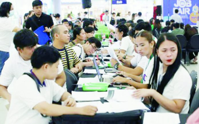 holiday_employment_resized_compressed Job applicants during the Trabaho para sa Pinoy job fair in a mall in Manila as photographed on Sept. 17, 2025. The Philippine Statistics Authority reported on Thursday, Nov. 6, 2025, the drop in the labor force participation rate in September 2025 to 64.5 percent from August’s 65.7 percent. PNA PHOTO BY YANCY LIM