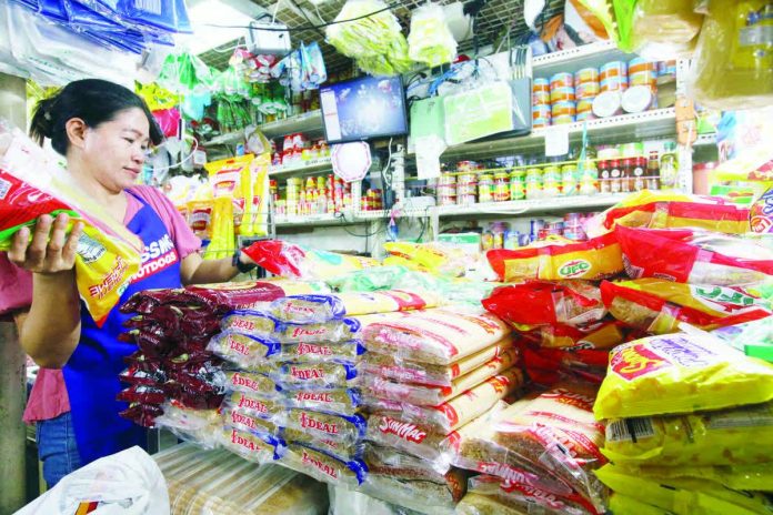 holiday_food_items_resized_compressed A store owner arranges food items at her stall at the Paco Public Market in Manila in this file photo. The Department of Trade and Industry says its price guide released on Nov. 9, 2025 reflects government efforts to keep Noche Buena items affordable in line with President Ferdinand R. Marcos Jr.’s directive. PNA PHOTO BY YANCY LIM