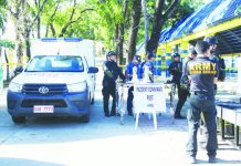 The Philippine National Police sets up a command post at Guimbal National High School in Guimbal town after it received a bomb threat on Monday, Nov. 17, 2025. “We are offering P100,000 reward for any useful information that could effectively or lead to something concrete in the identification and arrest of those behind the recent bomb threats,” Gov. Arthur Defensor Jr. says. AJ PALCULLO/PN