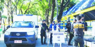 The Philippine National Police sets up a command post at Guimbal National High School in Guimbal town after it received a bomb threat on Monday, Nov. 17, 2025. “We are offering P100,000 reward for any useful information that could effectively or lead to something concrete in the identification and arrest of those behind the recent bomb threats,” Gov. Arthur Defensor Jr. says. AJ PALCULLO/PN