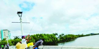 Anglers cast their lines along the Iloilo River Esplanade — an everyday routine for many – before the Iloilo City’s four-month fishing shutdown takes effect on December 1, 2025. PN FILE