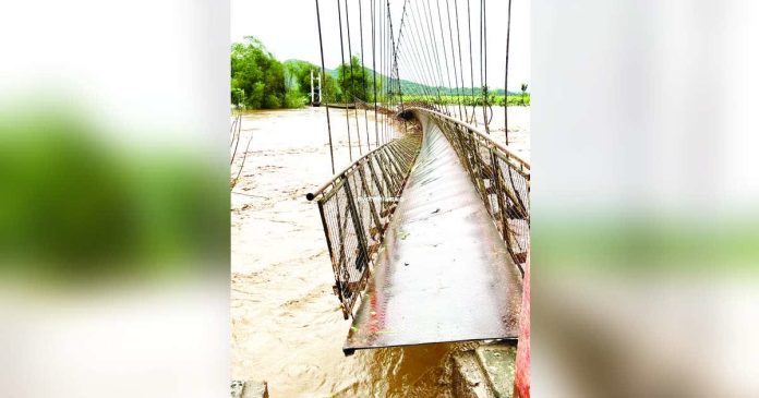 This hanging bridge in Hacienda Alicia, Barangay 5, Isabela, Negros Occidental was destroyed by Typhoon “Tino”, on Nov. 4, 2025. PHOTO COURTESY OF BYAHE NI WAWA