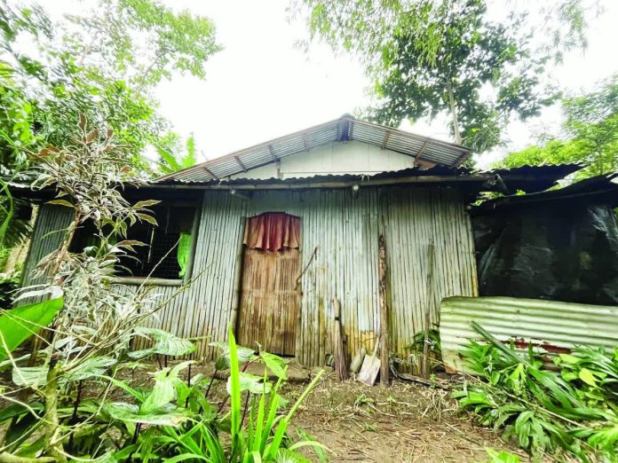 neljoy_lambunao_girl_resized_compressed The modest home in Barangay Tampucao, Lambunao, Iloilo, where a seven-year-old girl was found dead inside a sack on November 8, 2025. The suspected rape-slay has left the quiet community shocked and grief-stricken. RMN-ILOILO PHOTO