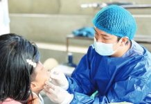 WV oral care drive seeks to endculture of ‘bunot’ and ‘pustiso’ A Department of Health dentist checks the teeth of a boy. The department promotes preventive dental care and good oral hygiene among Filipinos. DOH-6 PHOTO