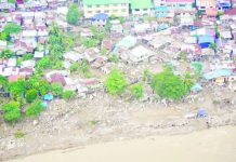 DTI sets 60-day nationwide price freeze on basic goods This aerial photo shows damaged houses in the aftermath of Typhoon "Tino" in Cebu. The Office of Civil Defense on Friday, November 7, conducted an aerial survey of areas hit by "Tino" in the province. Civil Defense PH/Facebook photo