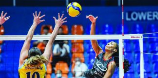 Chery Tiggo Crossovers’ Yuni Batista scores against Capital1 Solar Spikers’ Iris Tolenada. PVL PHOTO