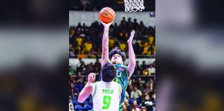 Far Eastern University Tamaraws rookie Kirby Mongcopa slips past De La Salle University big man Luis Pablo for a crucial basket during their UAAP Season 88 showdown. UAAP PHOTO