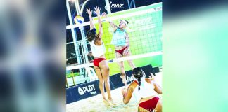 Cherry Rondina rises for a kill against her defender during the PNVF Beach Volleyball Invitational. BVR PHOTO