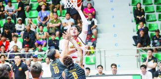 San Miguel Beermen center June Mar Fajardo rises for a one-hander against Titan Ultra’s interior defense during their explosive 158-point win. PBA PHOTO