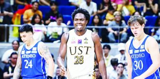 Collins Akowe powers the University of Santo Tomas Growling Tigers past the Ateneo de Manila University Blue Eagles with a dominant double-double performance. UAAP PHOTO