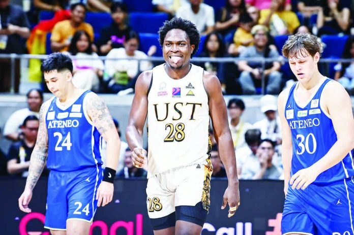 sports_Akowe_resized_compressed Collins Akowe powers the University of Santo Tomas Growling Tigers past the Ateneo de Manila University Blue Eagles with a dominant double-double performance. UAAP PHOTO