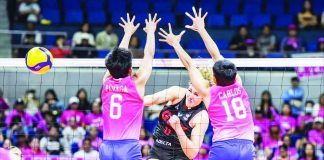 Lindsey Vander Weide of Petro Gazz Angels smashes the ball against the defense of Creamline’s Diana Carlos and Jeanette Panaga. PVL PHOTO