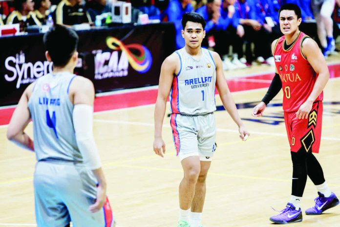 sports_Arellano_resized_compressed T-Mc Ongotan spearheaded Arellano University Chiefs' upset win over Mapua University Cardinals. NCAA PHOTO
