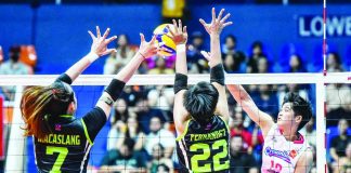 Creamline Cool Smashers’ Diana Carlos scores against the double block of Nxled Chameleons’ Krich Macaslang and Jovelyn Fernandez during their PVL Reinforced Conference match at the Filoil Center in San Juan. PVL PHOTO